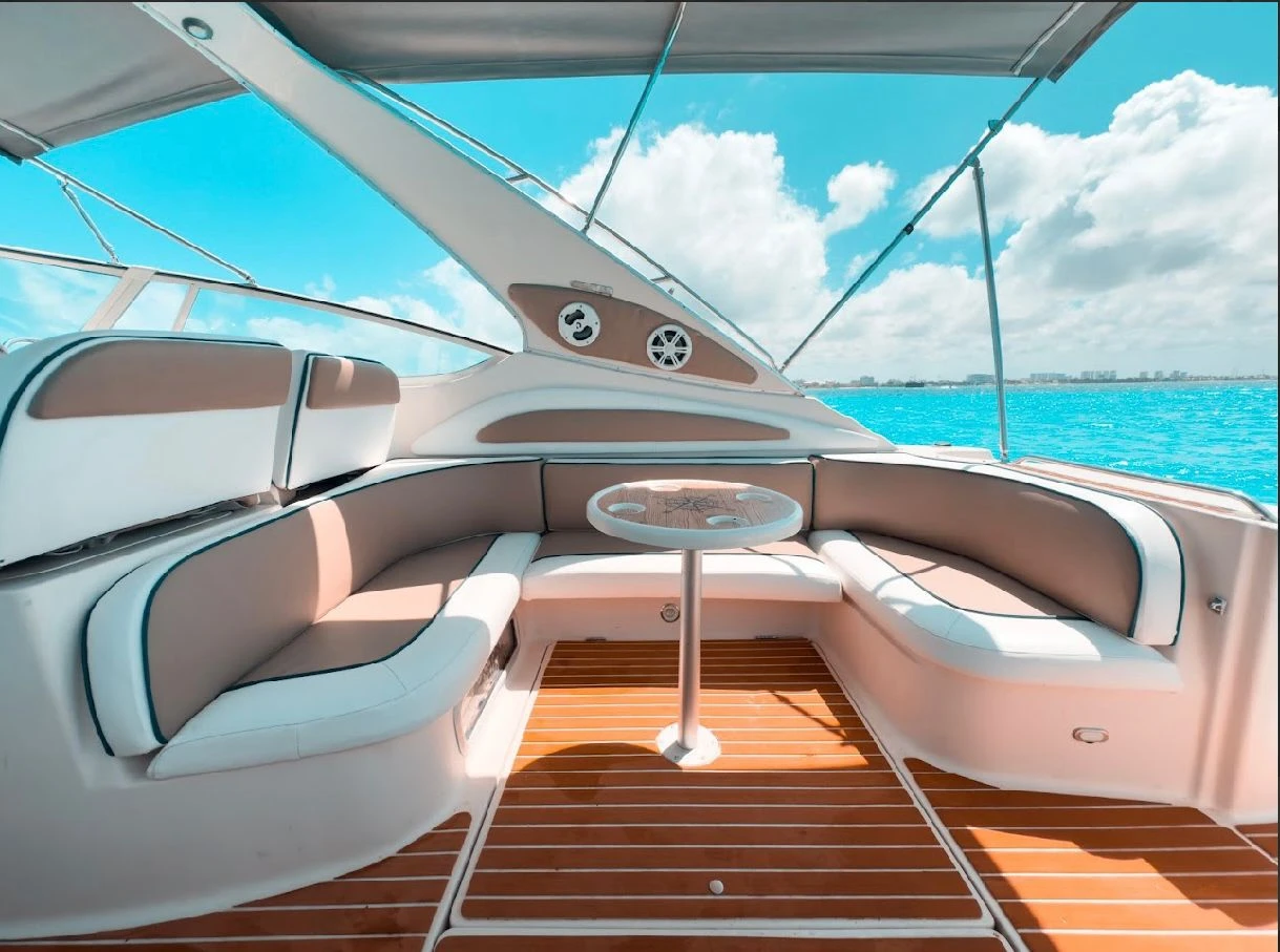 Aerial view of yacht in turquoise water